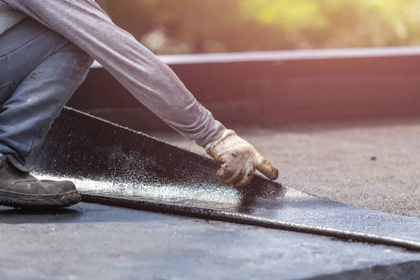 Professional Waterproofing technician working in Midland, OH